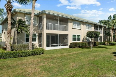 1st floor villa offers golf course views from its screened lanai on Santa Lucia River Club in Florida - for sale on GolfHomes.com, golf home, golf lot