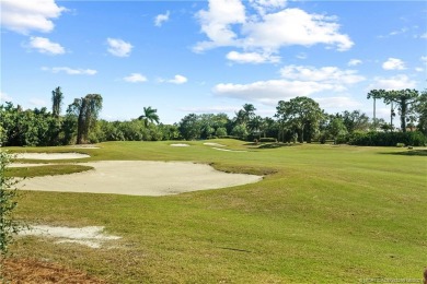 1st floor villa offers golf course views from its screened lanai on Santa Lucia River Club in Florida - for sale on GolfHomes.com, golf home, golf lot