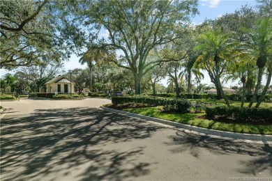 1st floor villa offers golf course views from its screened lanai on Santa Lucia River Club in Florida - for sale on GolfHomes.com, golf home, golf lot