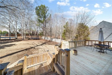 This beautiful 6-bedroom, 4.5-bath all-brick home sits on a on Moores Mill Golf Club in Alabama - for sale on GolfHomes.com, golf home, golf lot