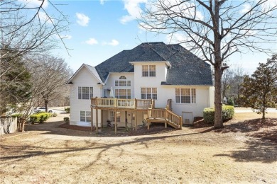 This beautiful 6-bedroom, 4.5-bath all-brick home sits on a on Moores Mill Golf Club in Alabama - for sale on GolfHomes.com, golf home, golf lot