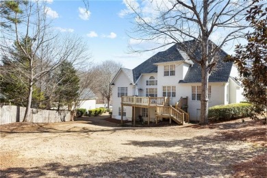 This beautiful 6-bedroom, 4.5-bath all-brick home sits on a on Moores Mill Golf Club in Alabama - for sale on GolfHomes.com, golf home, golf lot