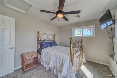 This stunning1.5-story home offers 4 bedrooms and 2.5 bathrooms on Chaparral Golf and Country Club in Arizona - for sale on GolfHomes.com, golf home, golf lot