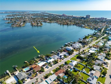 Secluded within the exclusive Boca Ciega Isle neighborhood, this on Isla Del Sol Yacht and Country Club in Florida - for sale on GolfHomes.com, golf home, golf lot