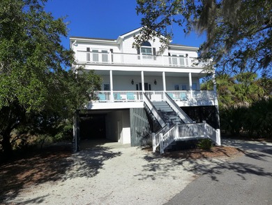 Spacious 2-story home offering panoramic views of the salt marsh on The Plantation Course At Edisto in South Carolina - for sale on GolfHomes.com, golf home, golf lot