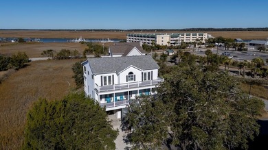 Spacious 2-story home offering panoramic views of the salt marsh on The Plantation Course At Edisto in South Carolina - for sale on GolfHomes.com, golf home, golf lot