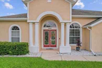 Discover your ideal Lakefront Pool Home at the end of a quiet on Oaks National Golf Course in Florida - for sale on GolfHomes.com, golf home, golf lot