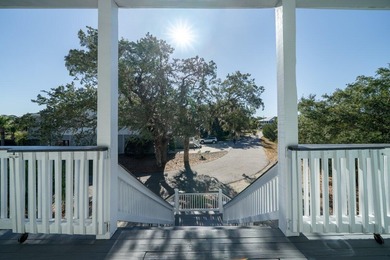 Spacious 2-story home offering panoramic views of the salt marsh on The Plantation Course At Edisto in South Carolina - for sale on GolfHomes.com, golf home, golf lot