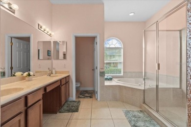 Discover your ideal Lakefront Pool Home at the end of a quiet on Oaks National Golf Course in Florida - for sale on GolfHomes.com, golf home, golf lot
