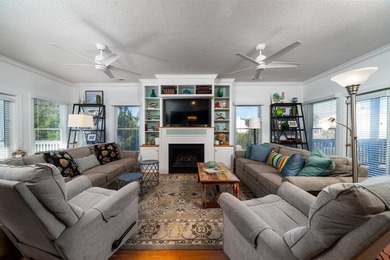 Spacious 2-story home offering panoramic views of the salt marsh on The Plantation Course At Edisto in South Carolina - for sale on GolfHomes.com, golf home, golf lot