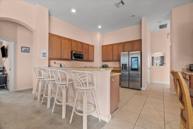 Discover your ideal Lakefront Pool Home at the end of a quiet on Oaks National Golf Course in Florida - for sale on GolfHomes.com, golf home, golf lot