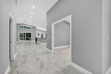 Beautifully renovated 3BR/2BA home in the amazing non-gated on Westchester Golf and Country Club in Florida - for sale on GolfHomes.com, golf home, golf lot