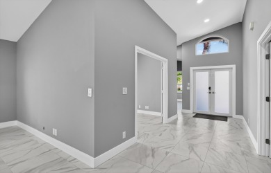 Beautifully renovated 3BR/2BA home in the amazing non-gated on Westchester Golf and Country Club in Florida - for sale on GolfHomes.com, golf home, golf lot