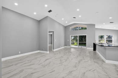 Beautifully renovated 3BR/2BA home in the amazing non-gated on Westchester Golf and Country Club in Florida - for sale on GolfHomes.com, golf home, golf lot