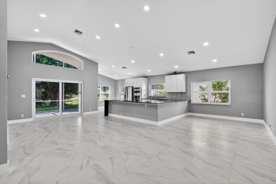 Beautifully renovated 3BR/2BA home in the amazing non-gated on Westchester Golf and Country Club in Florida - for sale on GolfHomes.com, golf home, golf lot