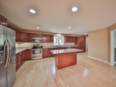 This Magnificent three level home has 9 substantial bedrooms and on Country Club of the Poconos Golf Course in Pennsylvania - for sale on GolfHomes.com, golf home, golf lot