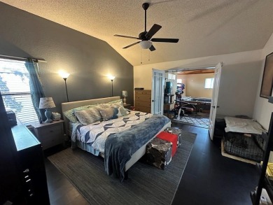 Amazing escape!  This gorgeous home is located in a large pocket on Mesquite Municipal Golf Course in Texas - for sale on GolfHomes.com, golf home, golf lot