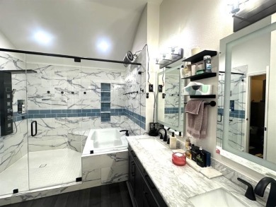 Amazing escape!  This gorgeous home is located in a large pocket on Mesquite Municipal Golf Course in Texas - for sale on GolfHomes.com, golf home, golf lot