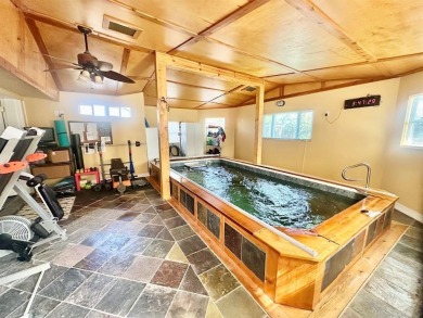 Amazing escape!  This gorgeous home is located in a large pocket on Mesquite Municipal Golf Course in Texas - for sale on GolfHomes.com, golf home, golf lot