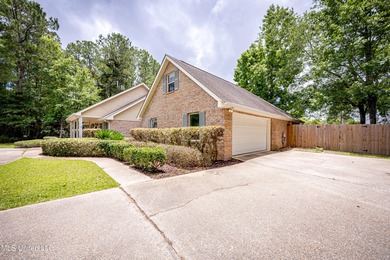 WELCOME HOME! This beautiful well maintained home sits on a on Diamondhead Country Club in Mississippi - for sale on GolfHomes.com, golf home, golf lot
