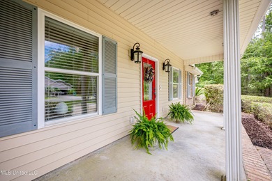 WELCOME HOME! This beautiful well maintained home sits on a on Diamondhead Country Club in Mississippi - for sale on GolfHomes.com, golf home, golf lot