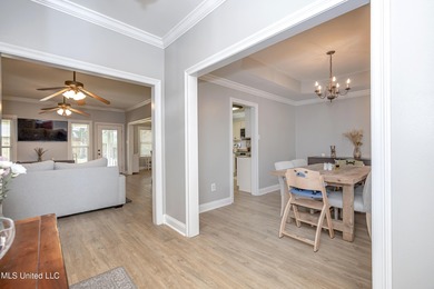 WELCOME HOME! This beautiful well maintained home sits on a on Diamondhead Country Club in Mississippi - for sale on GolfHomes.com, golf home, golf lot