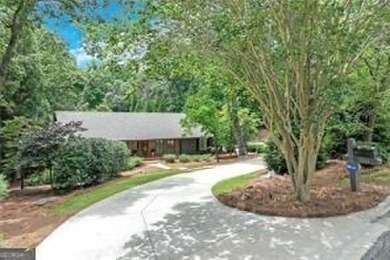 A Timeless Treasure in Chattahoochee Estates    Set on a on Chattahoochee Golf Course in Georgia - for sale on GolfHomes.com, golf home, golf lot