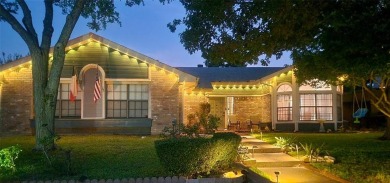 Amazing escape!  This gorgeous home is located in a large pocket on Mesquite Municipal Golf Course in Texas - for sale on GolfHomes.com, golf home, golf lot