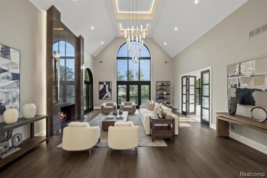 Set on over two acres along the coveted shores of all-sports on Orchard Lake Country Club in Michigan - for sale on GolfHomes.com, golf home, golf lot