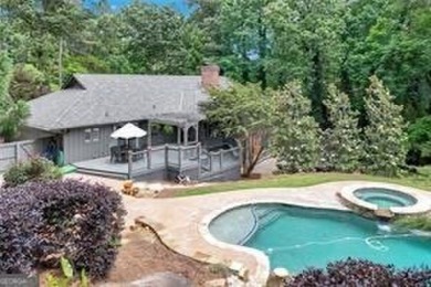 A Timeless Treasure in Chattahoochee Estates    Set on a on Chattahoochee Golf Course in Georgia - for sale on GolfHomes.com, golf home, golf lot