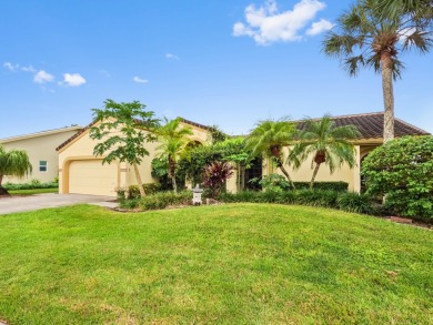 This stunning lakefront home in the highly desirable Elysium on Village Golf Club in Florida - for sale on GolfHomes.com, golf home, golf lot