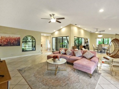 This stunning lakefront home in the highly desirable Elysium on Village Golf Club in Florida - for sale on GolfHomes.com, golf home, golf lot