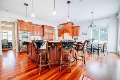 This exquisite brick home is tucked away on a cul-de-sac within on Pinewild Country Club of Pinehurst in North Carolina - for sale on GolfHomes.com, golf home, golf lot