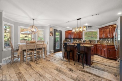 Welcome to this beautiful 4-bedroom, 2.5-bath home perfectly on Eagle Crest Golf Course in Arkansas - for sale on GolfHomes.com, golf home, golf lot