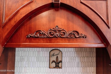 This exquisite brick home is tucked away on a cul-de-sac within on Pinewild Country Club of Pinehurst in North Carolina - for sale on GolfHomes.com, golf home, golf lot