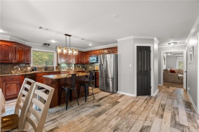 Welcome to this beautiful 4-bedroom, 2.5-bath home perfectly on Eagle Crest Golf Course in Arkansas - for sale on GolfHomes.com, golf home, golf lot