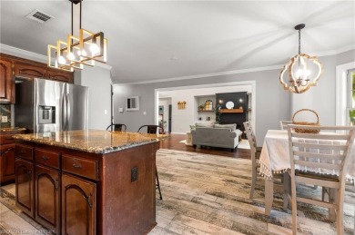 Welcome to this beautiful 4-bedroom, 2.5-bath home perfectly on Eagle Crest Golf Course in Arkansas - for sale on GolfHomes.com, golf home, golf lot