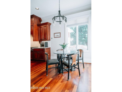 This exquisite brick home is tucked away on a cul-de-sac within on Pinewild Country Club of Pinehurst in North Carolina - for sale on GolfHomes.com, golf home, golf lot