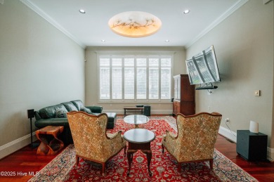 This exquisite brick home is tucked away on a cul-de-sac within on Pinewild Country Club of Pinehurst in North Carolina - for sale on GolfHomes.com, golf home, golf lot
