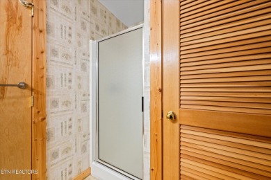 This Gatlinburg cabin offers the perfect blend of convenience on Bent Creek Golf Course in Tennessee - for sale on GolfHomes.com, golf home, golf lot