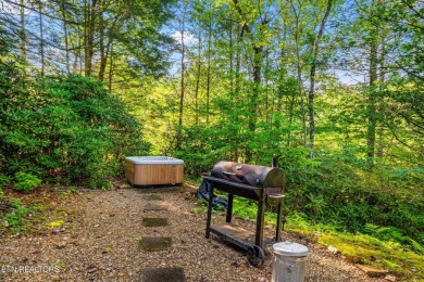This Gatlinburg cabin offers the perfect blend of convenience on Bent Creek Golf Course in Tennessee - for sale on GolfHomes.com, golf home, golf lot