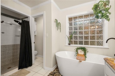 Welcome to this beautiful 4-bedroom, 2.5-bath home perfectly on Eagle Crest Golf Course in Arkansas - for sale on GolfHomes.com, golf home, golf lot