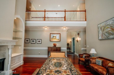 This exquisite brick home is tucked away on a cul-de-sac within on Pinewild Country Club of Pinehurst in North Carolina - for sale on GolfHomes.com, golf home, golf lot