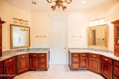 This exquisite brick home is tucked away on a cul-de-sac within on Pinewild Country Club of Pinehurst in North Carolina - for sale on GolfHomes.com, golf home, golf lot