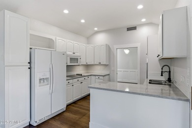 Experience luxury and convenience in this turnkey 2-bed, 2-bath on Gainey Ranch Golf Club in Arizona - for sale on GolfHomes.com, golf home, golf lot