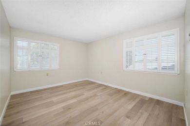 Private and move-in ready 2 bedroom 2 bathroom upstairs unit in on Leisure World Seal Beach Golf Course in California - for sale on GolfHomes.com, golf home, golf lot