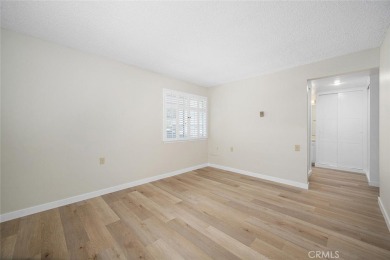 Private and move-in ready 2 bedroom 2 bathroom upstairs unit in on Leisure World Seal Beach Golf Course in California - for sale on GolfHomes.com, golf home, golf lot