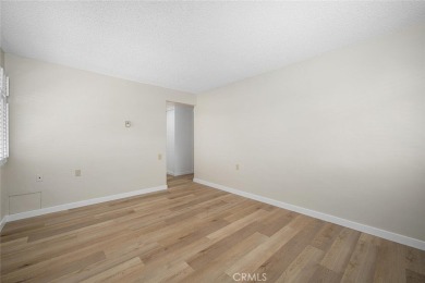 Private and move-in ready 2 bedroom 2 bathroom upstairs unit in on Leisure World Seal Beach Golf Course in California - for sale on GolfHomes.com, golf home, golf lot