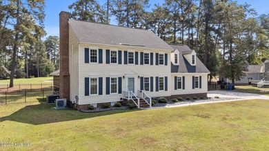 Welcome home to 4804 Burning Tree Lane North, a stately home set on Wilson Country Club in North Carolina - for sale on GolfHomes.com, golf home, golf lot
