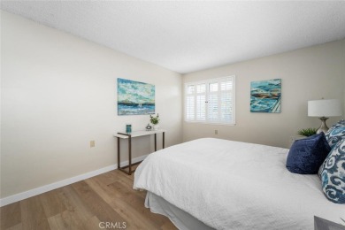 Private and move-in ready 2 bedroom 2 bathroom upstairs unit in on Leisure World Seal Beach Golf Course in California - for sale on GolfHomes.com, golf home, golf lot